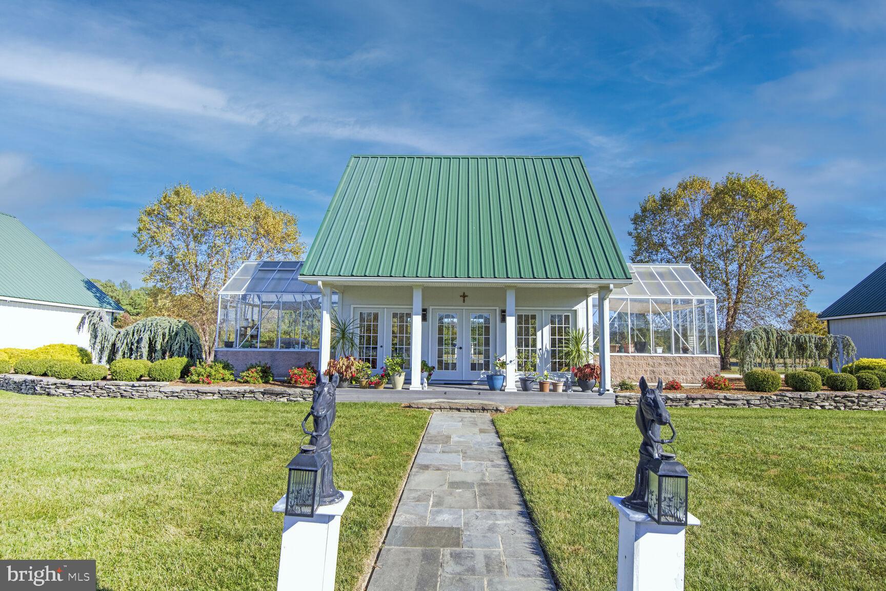 5289 Ferry Neck Road Royal Oak, MD 21662 - Photo 55 of 80 a front view of a building with garden