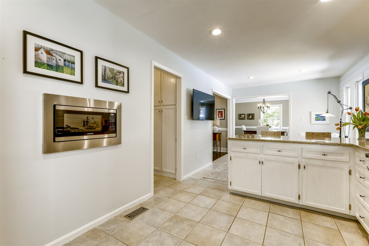 3501 Campbell Road Raleigh, NC 27606 - Photo 13 of 30 Bright, spacious kitchen with new microwave and new hardware Kitchen