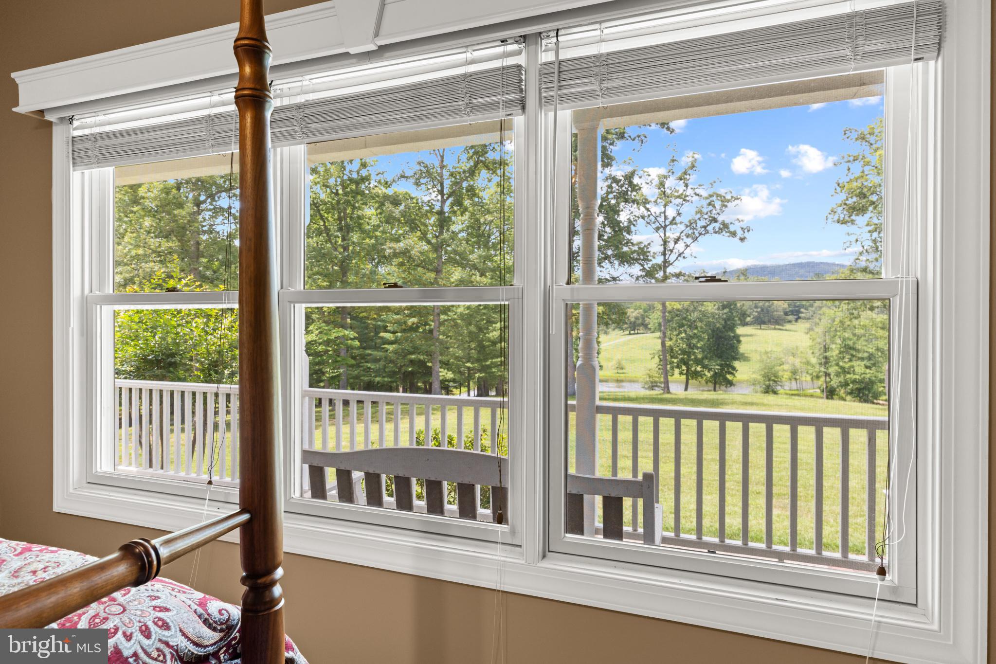 1688 Desert Road Reva, VA 22735 - Photo 33 of 81 a view of a porch with a wooden fence