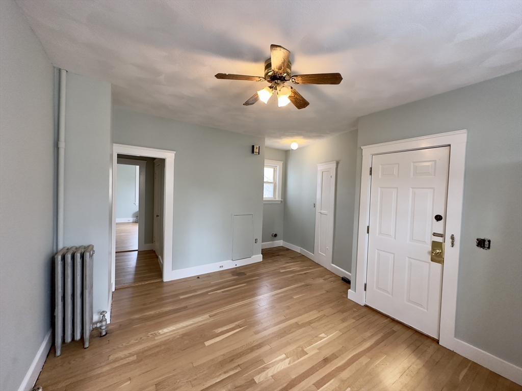 56 South Main Street Uxbridge, MA 01569 - Photo 11 of 14 a view of an empty room and wooden floor