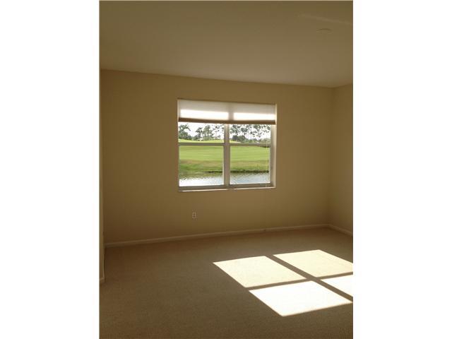 2023 Reston Circle Royal Palm Beach, FL 33411 - Photo 12 of 23 a view of an empty room with a window