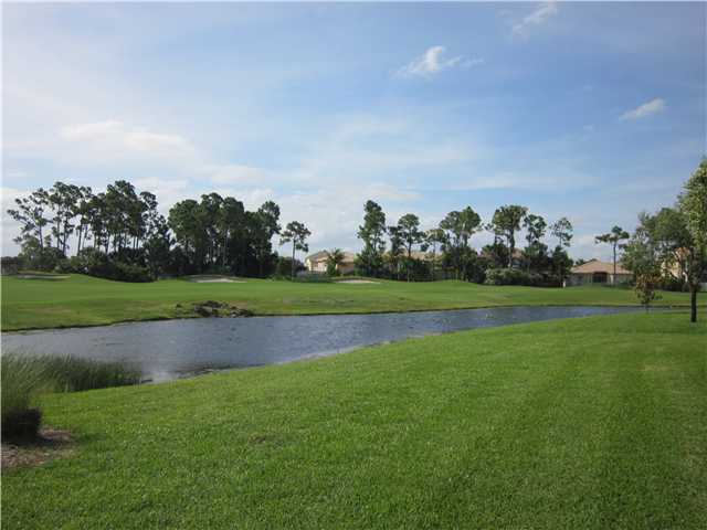 2023 Reston Circle Royal Palm Beach, FL 33411 - Photo 19 of 23 a view of field with grass and trees
