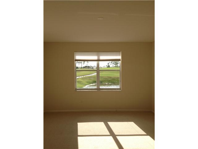 2023 Reston Circle Royal Palm Beach, FL 33411 - Photo 21 of 23 a view of an empty room with a window