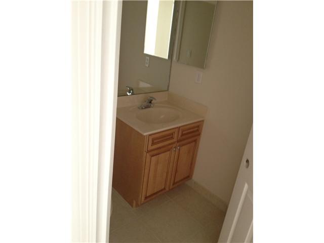 2023 Reston Circle Royal Palm Beach, FL 33411 - Photo 23 of 23 a utility room with a sink