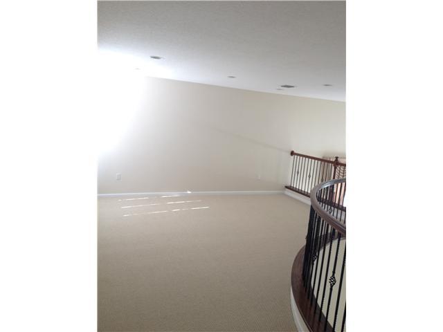 2023 Reston Circle Royal Palm Beach, FL 33411 - Photo 5 of 23 a view of a room with racks on the wall