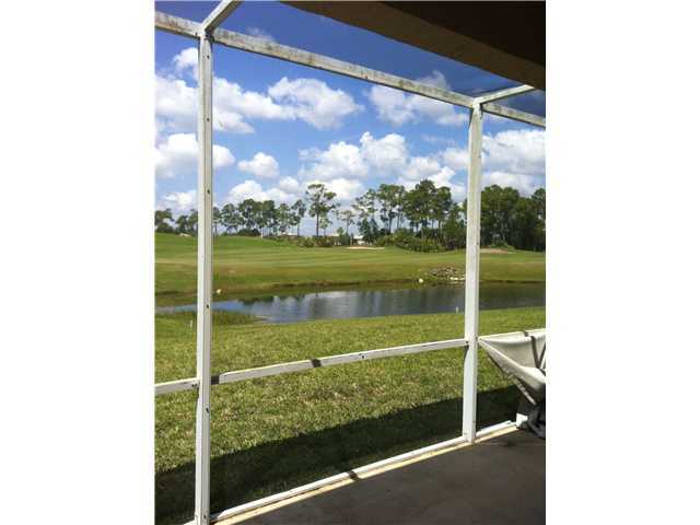 2023 Reston Circle Royal Palm Beach, FL 33411 - Photo 9 of 23 a view of a glass door with a yard