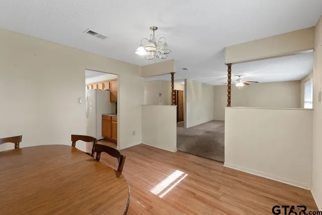 a view of a livingroom with a furniture
