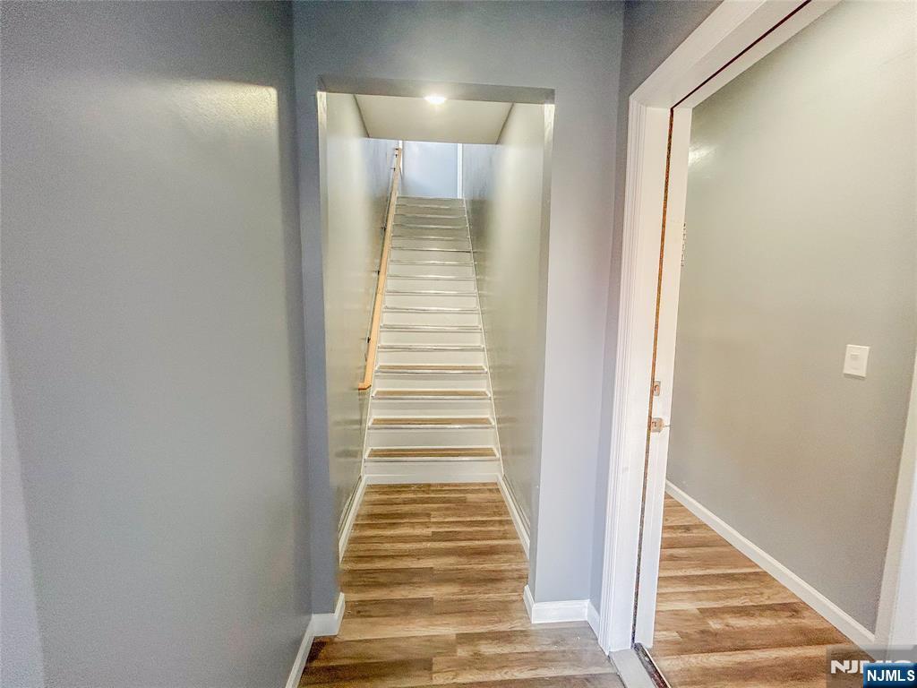 676 South 20th Street Newark, NJ 07103 - Photo 13 of 38 a view of a hallway with stairs