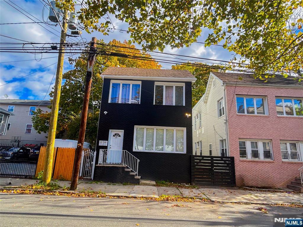 676 South 20th Street Newark, NJ 07103 - Photo 2 of 38 a view of a house with a patio