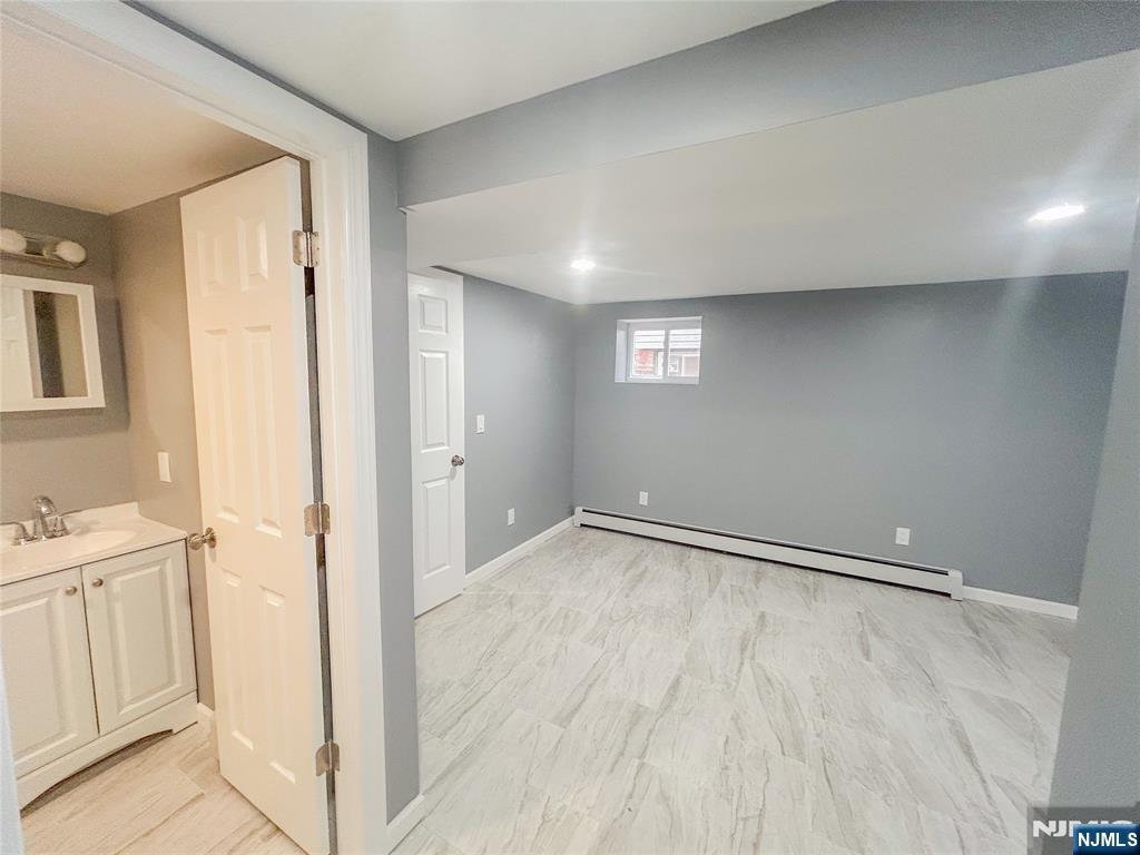 676 South 20th Street Newark, NJ 07103 - Photo 28 of 38 a view of an empty room and a window