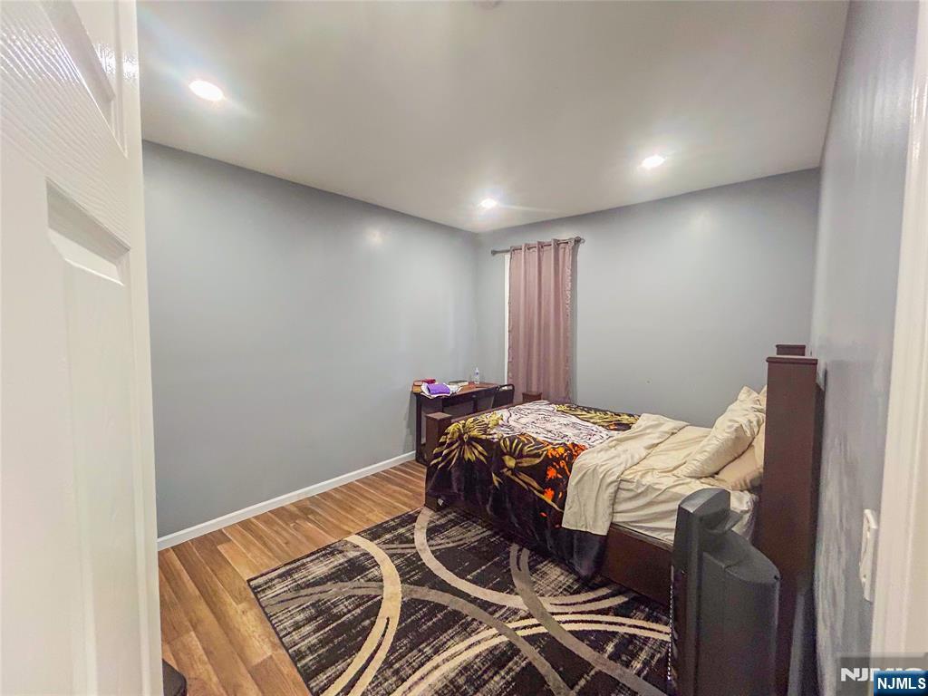 676 South 20th Street Newark, NJ 07103 - Photo 10 of 38 a room with furniture