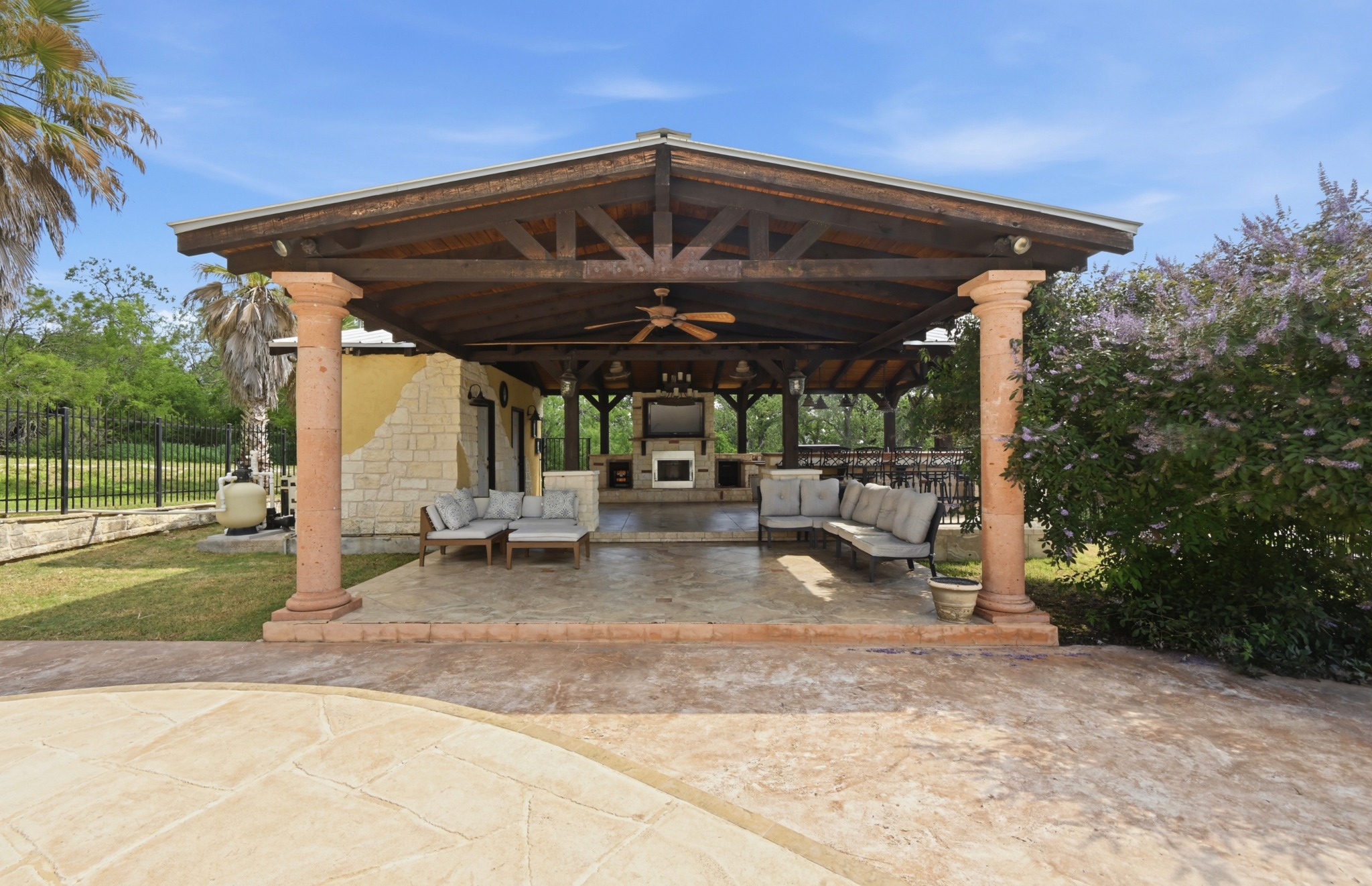1175 Southern Way Luling, TX 78648 - Photo 36 of 40 An inviting outdoor living area features a grand wooden ceiling, ideal for entertaining and relaxation.
