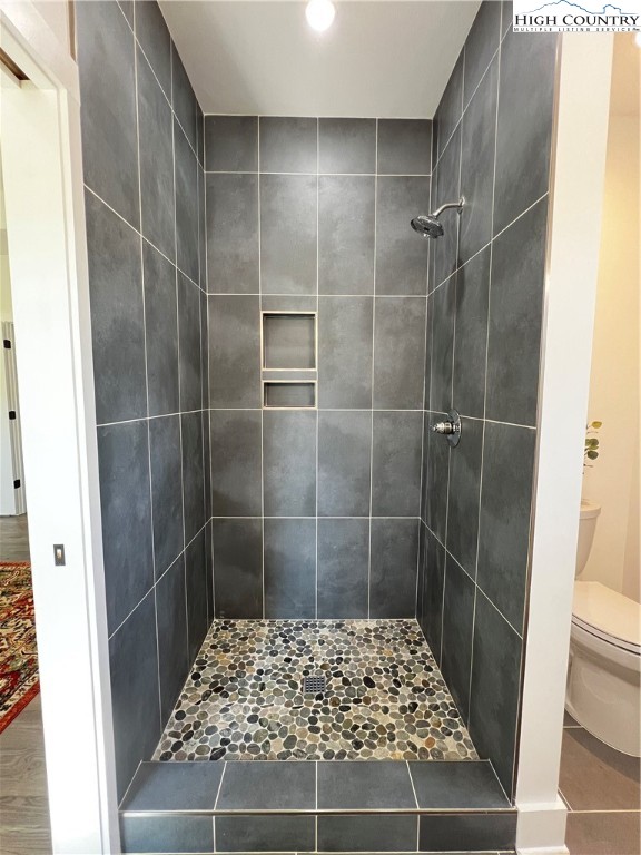 3991 Poplar Springs Road Elkin, NC 28621 - Photo 37 of 45 a bathroom with a shower