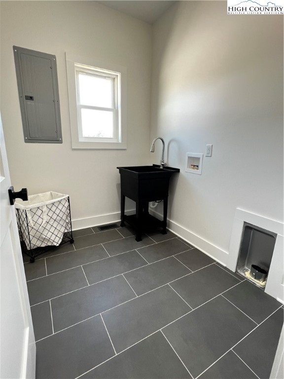 3991 Poplar Springs Road Elkin, NC 28621 - Photo 38 of 45 a room with a couch and a window