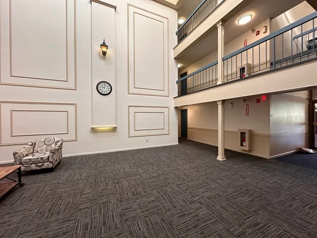 a view of an entryway with sitting area