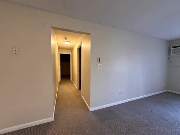 a view of a room with an empty space