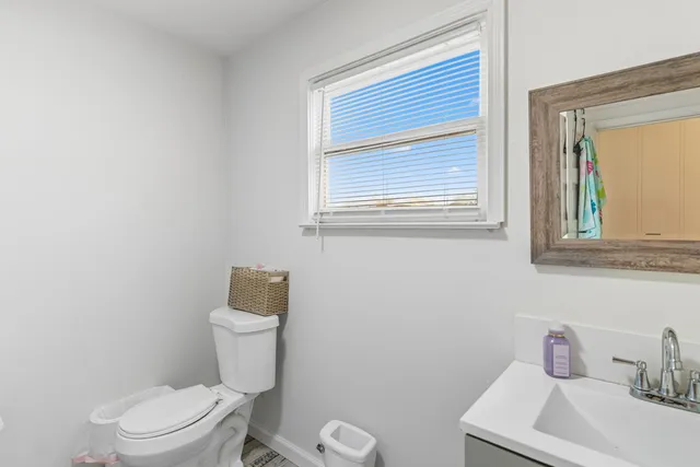 a room with furniture and a flat screen tv