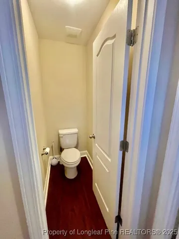 a bathroom with a bathtub and a window