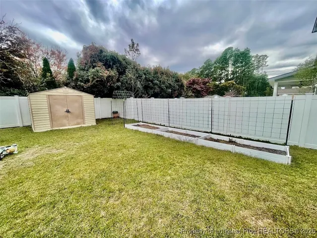 a view of a swimming pool with an outdoor seating