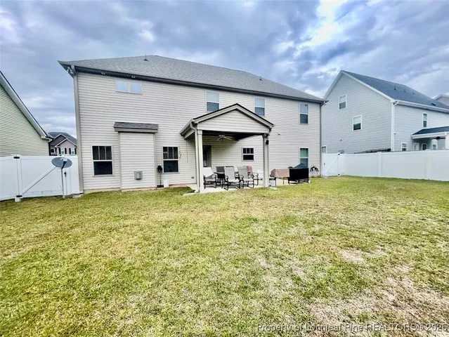 a view of a house with patio