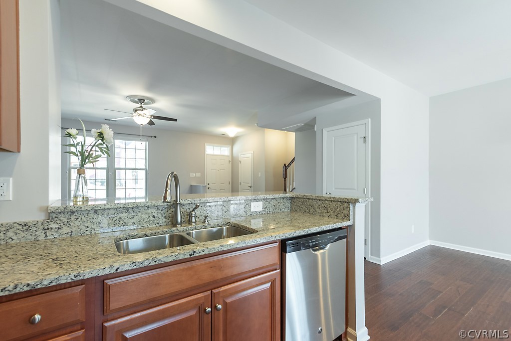 5613 Riverside Heights Way Richmond, VA 23225 - Photo 13 of 41 a bathroom with a granite countertop sink a light fixture and a mirror