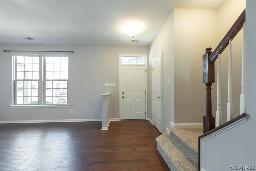 5613 Riverside Heights Way Richmond, VA 23225 - Photo 18 of 41 an empty room with wooden floor and a window