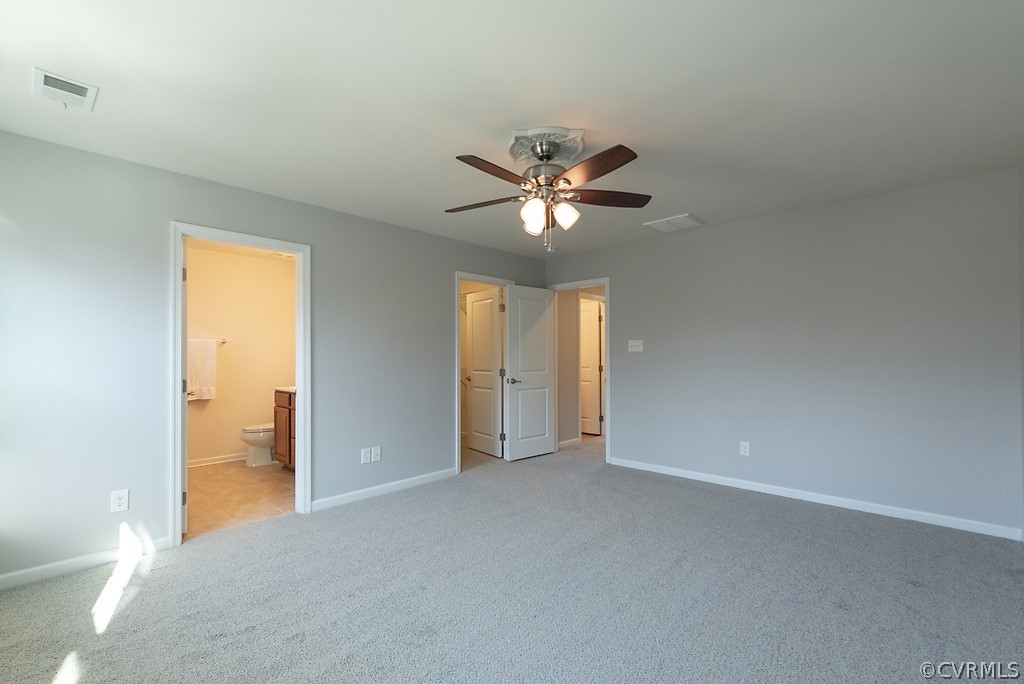 5613 Riverside Heights Way Richmond, VA 23225 - Photo 21 of 41 a view of an empty room with a window
