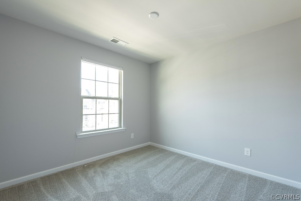 5613 Riverside Heights Way Richmond, VA 23225 - Photo 28 of 41 an empty room with a window