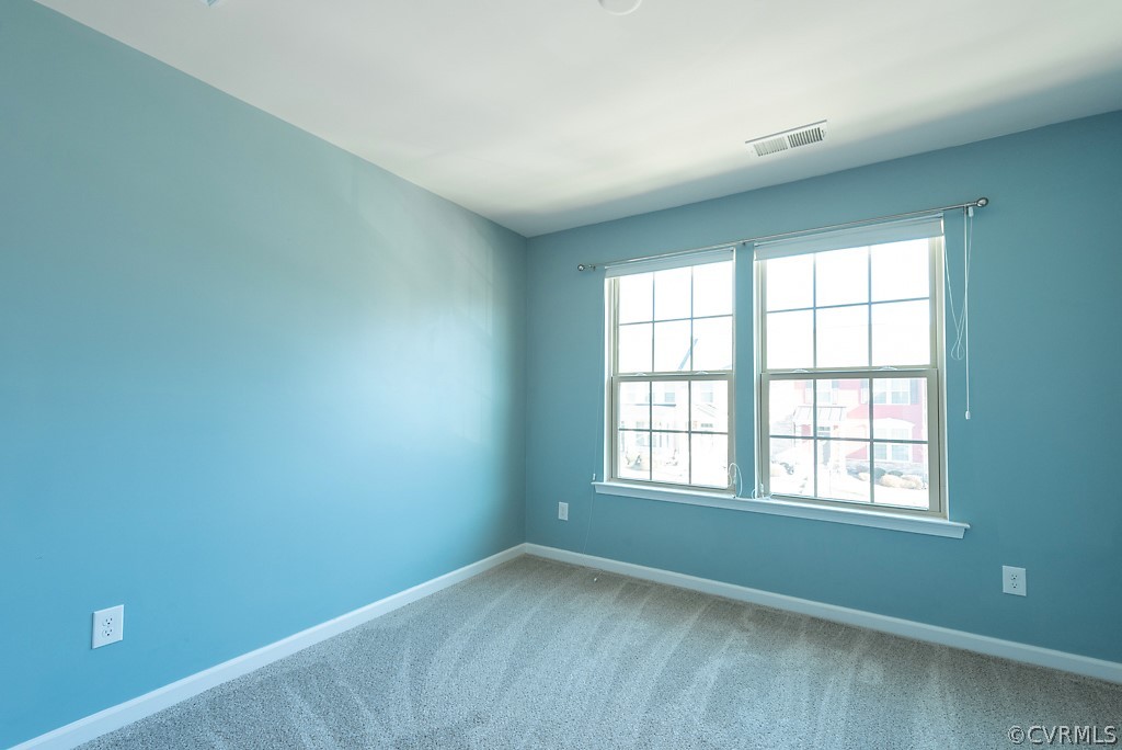 5613 Riverside Heights Way Richmond, VA 23225 - Photo 29 of 41 an empty room with a window