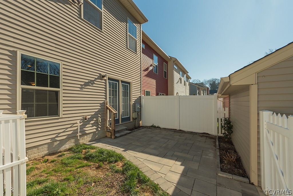 5613 Riverside Heights Way Richmond, VA 23225 - Photo 35 of 41 a view of a house with backyard