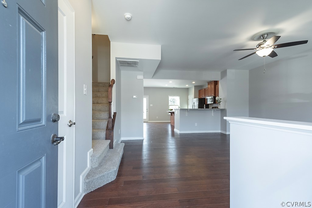 5613 Riverside Heights Way Richmond, VA 23225 - Photo 4 of 41 a view of a hallway with a kitchen