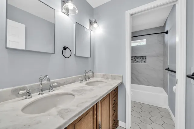 a bathroom with a bathtub and a toilet