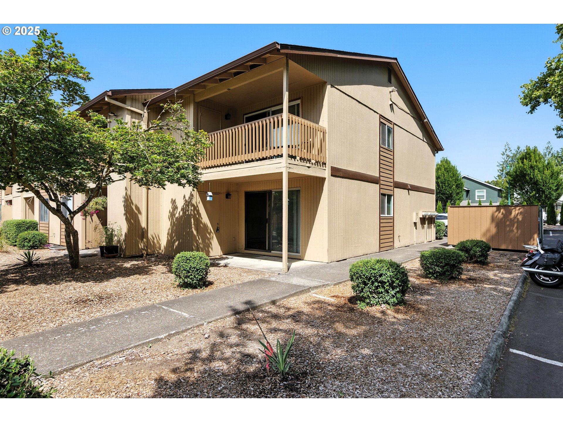 3404 19th Avenue, Unit 117 Forest Grove, OR 97116 - Photo 18 of 18 a view of a house with a yard