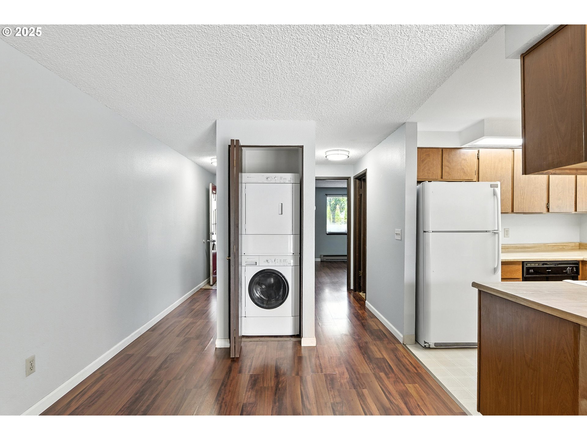 3404 19th Avenue, Unit 117 Forest Grove, OR 97116 - Photo 9 of 18 a kitchen with a refrigerator and a stove