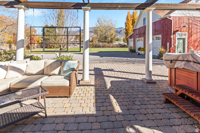 390 North 100 West Monroe, UT 84754 - Photo 69 of 167 View of patio / terrace featuring a mountain view, a pergola, and an outdoor hangout area