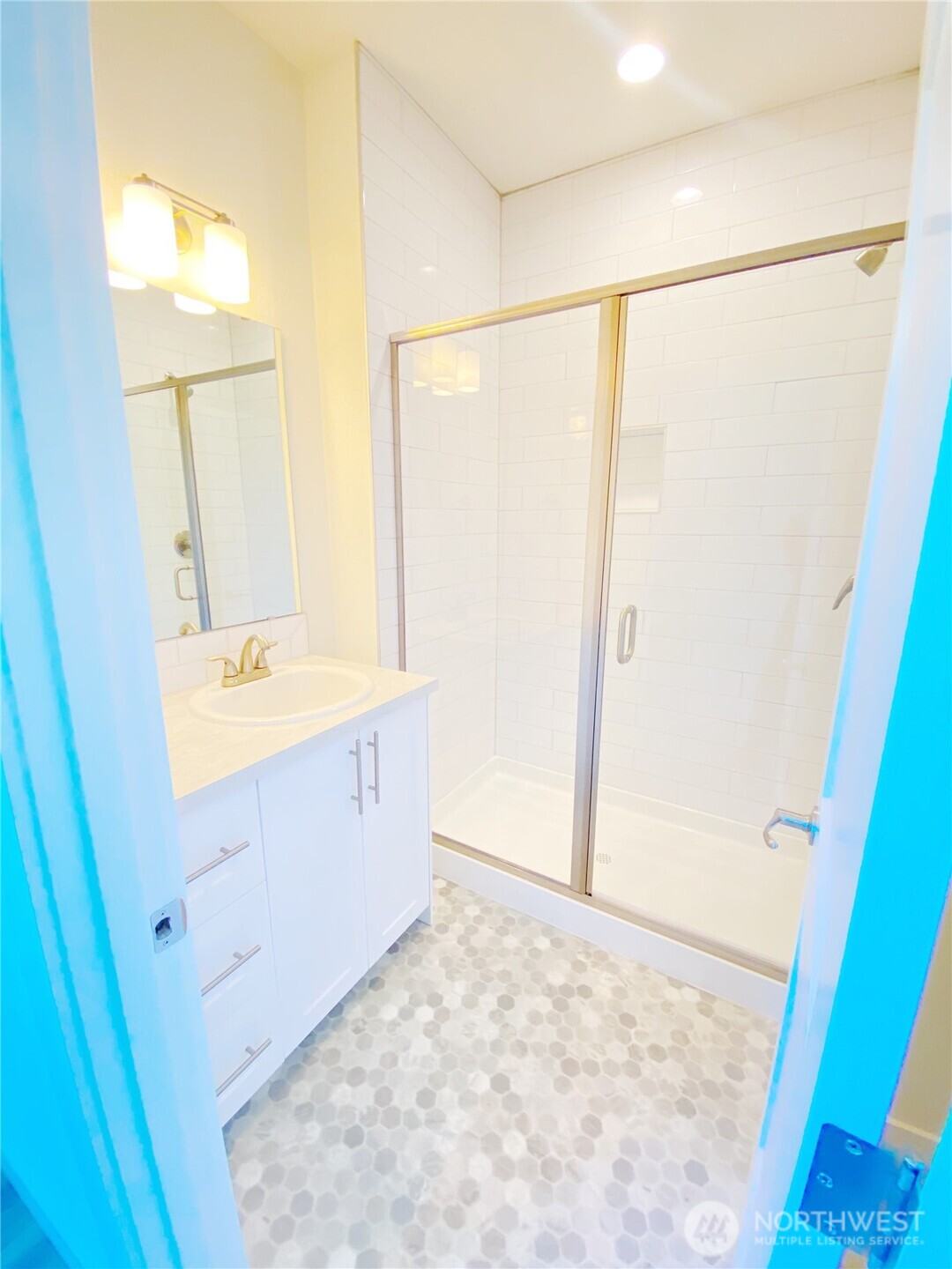 19019 Highway 3, Unit A Allyn, WA 98524 - Photo 13 of 22 a bathroom with a sink and a mirror
