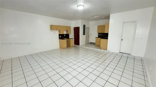 a view of a livingroom with an entryway