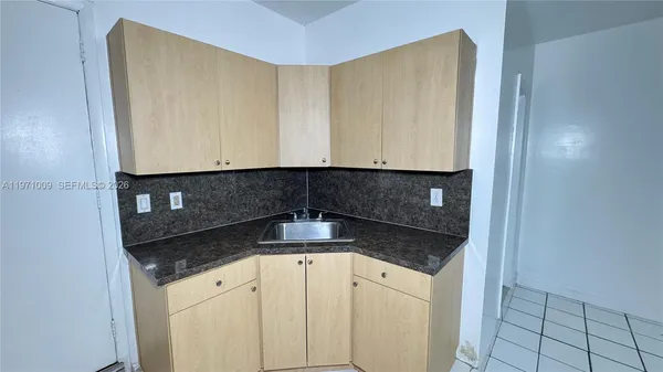 a bathroom with a mirror