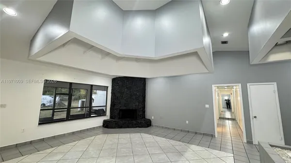 a view of an entryway with a room