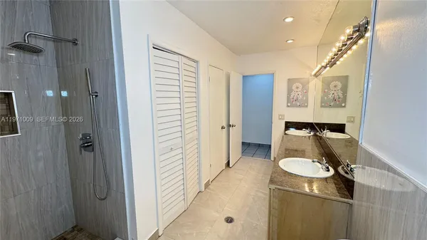 a view of a bathroom with a shower