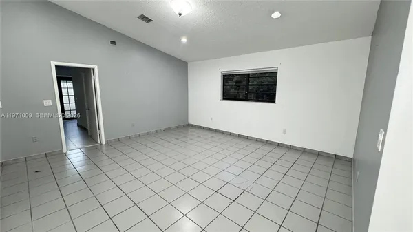 an empty room with an entryway