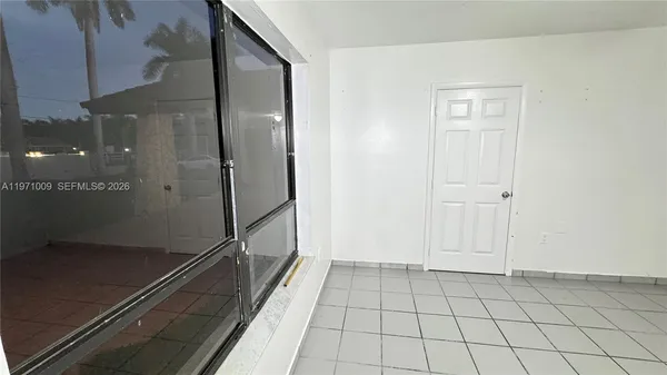 a view of a room with racks on the wall