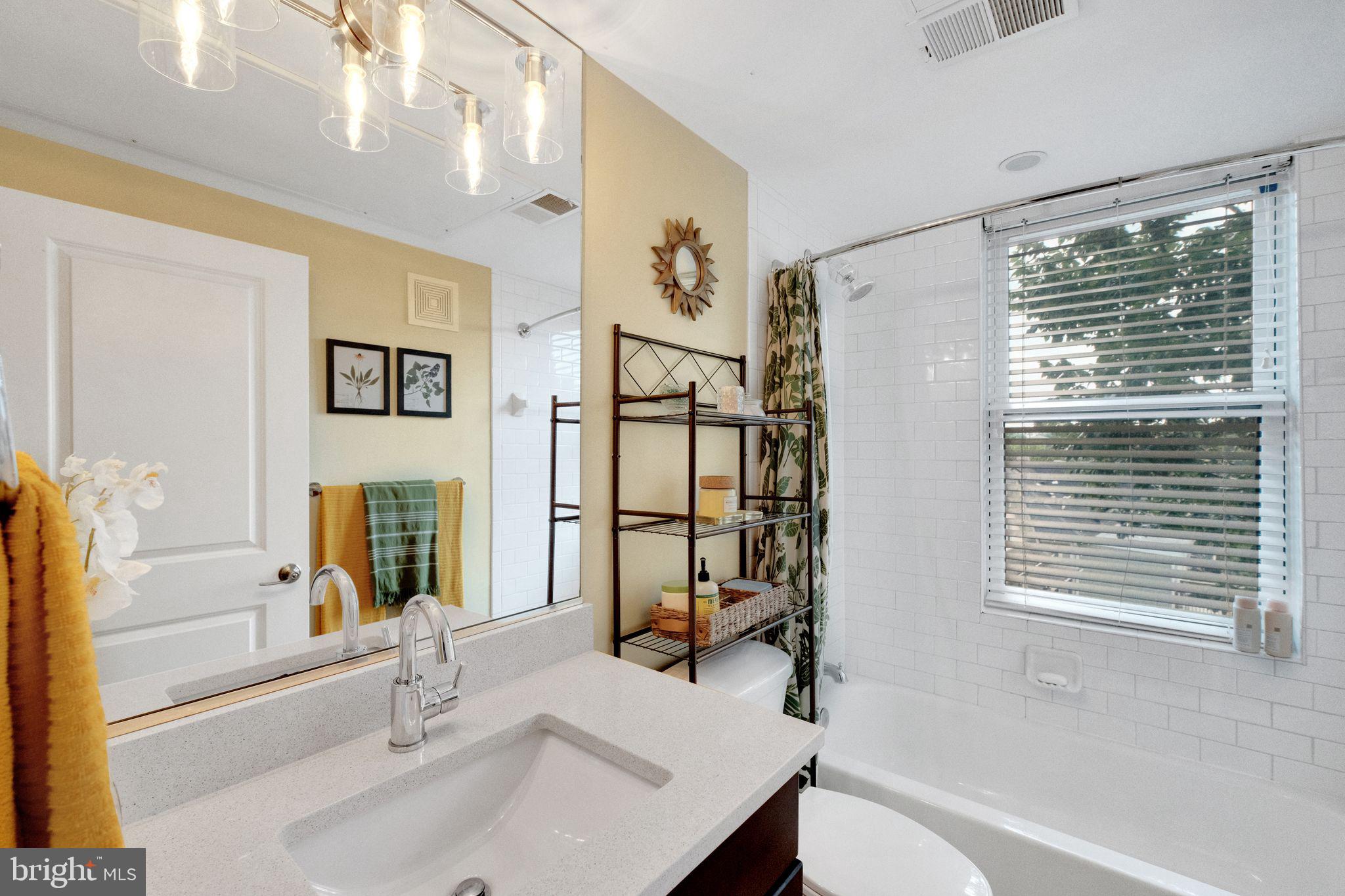 4800 Georgia Avenue Northwest, Unit 404 Washington, DC 20011 - Photo 17 of 23 Gleaming bathroom