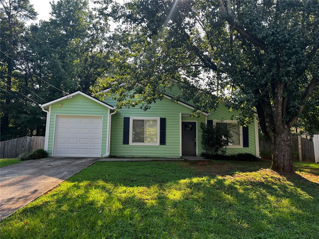 4170 Shiloh Ridge Trail Kennesaw, GA 30144 - Photo 1 of 19 a front view of house with yard and green space