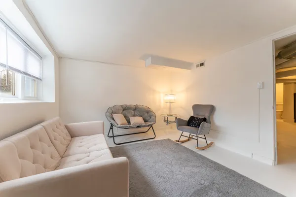 a view of a backyard with swimming pool