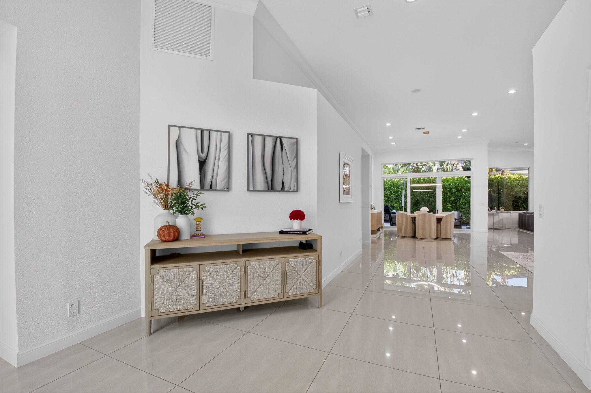 6270 Northwest 43rd Terrace Boca Raton, FL 33496 - Photo 2 of 27 a living room with furniture and a large window