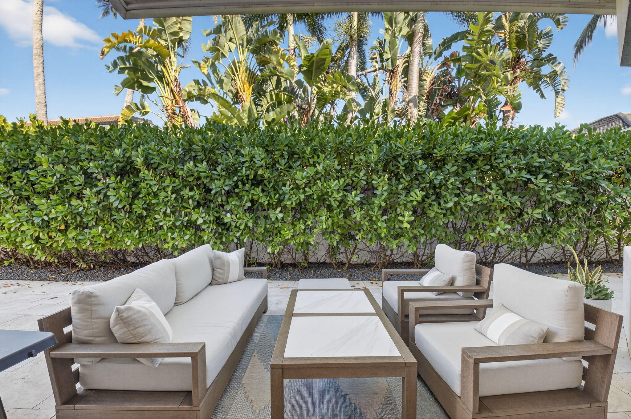 6270 Northwest 43rd Terrace Boca Raton, FL 33496 - Photo 23 of 27 a view of patio with couches and a potted plant