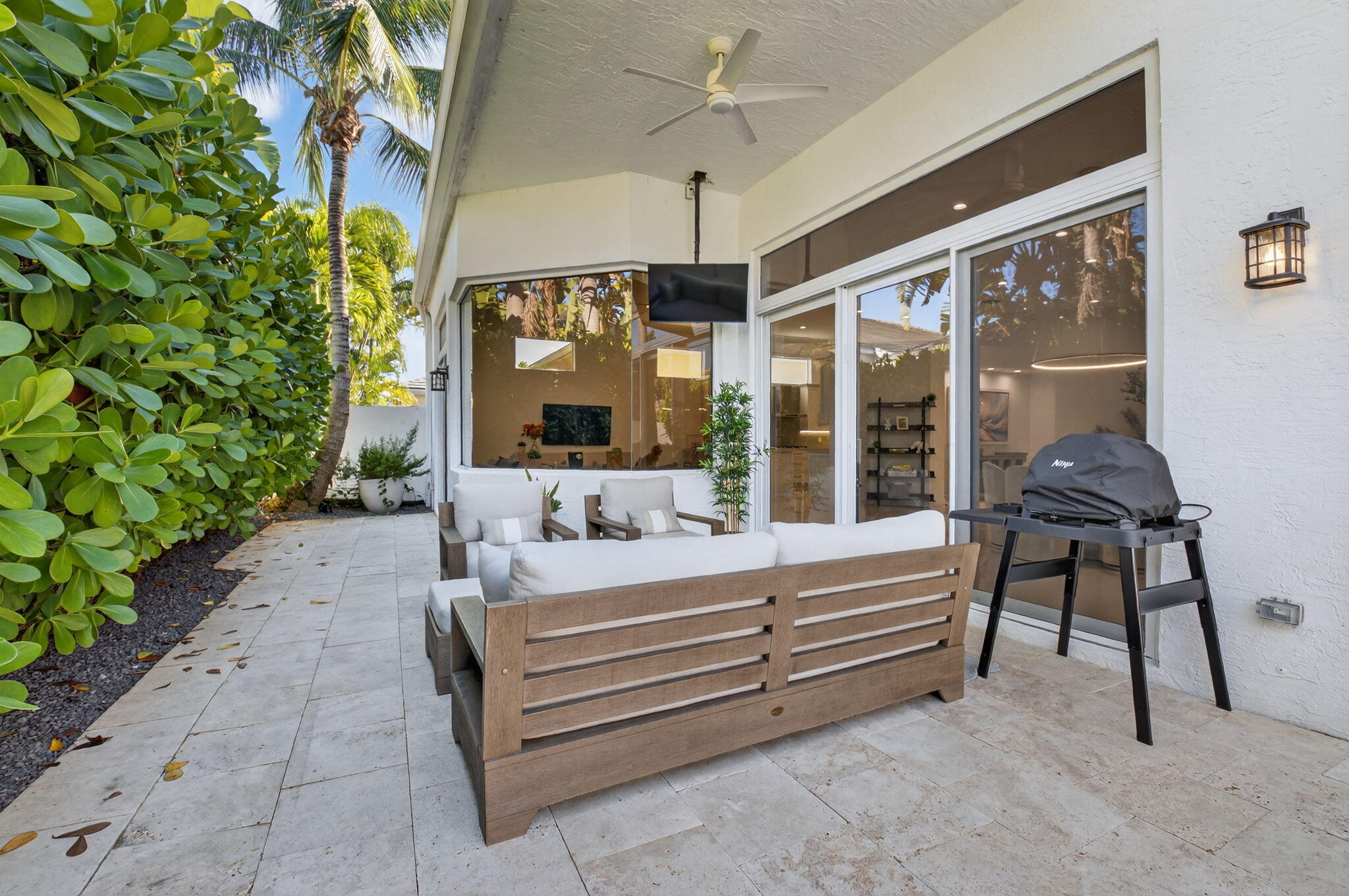 6270 Northwest 43rd Terrace Boca Raton, FL 33496 - Photo 24 of 27 a bedroom with a bed and a potted plant