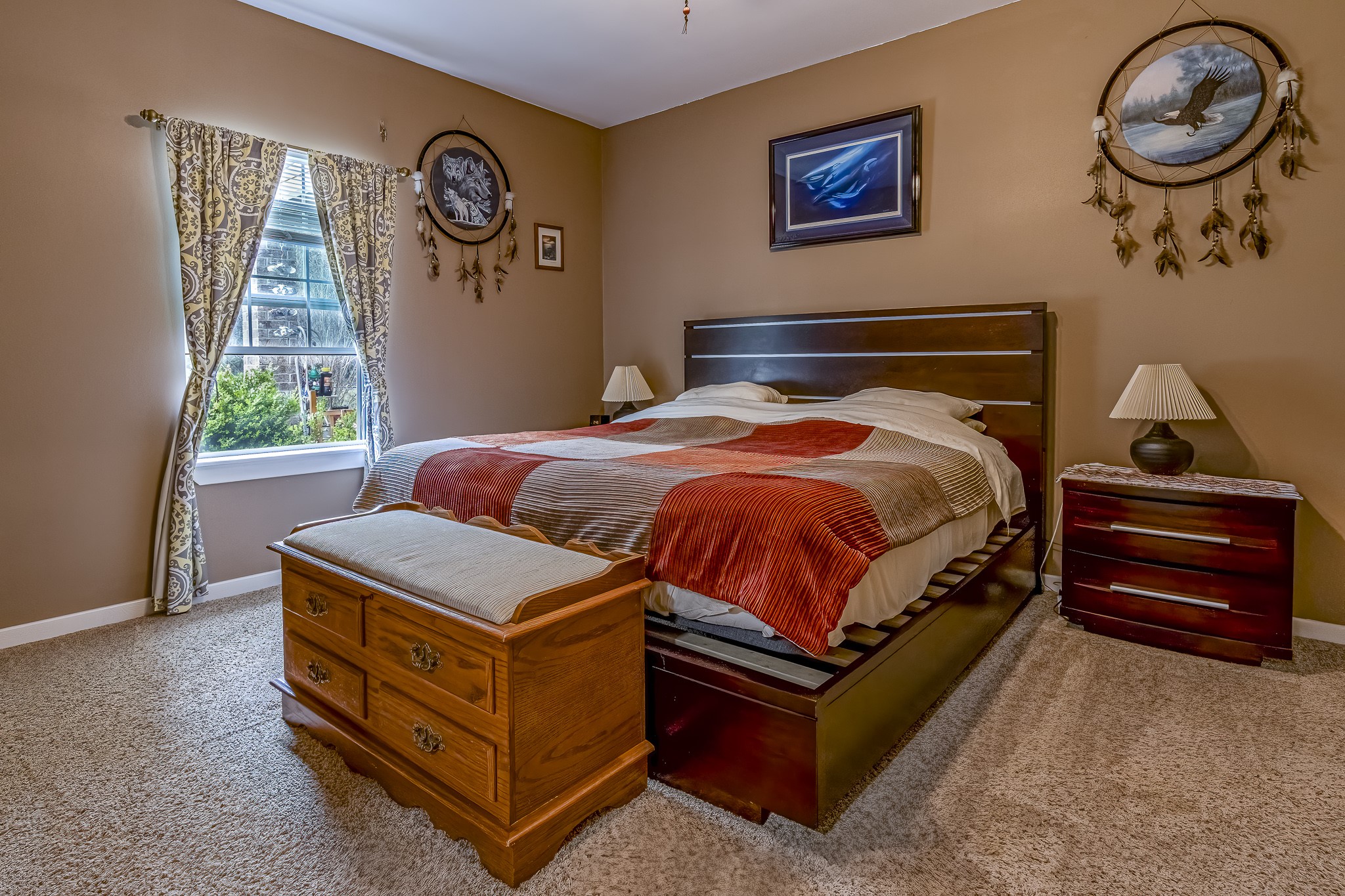 188 Pullin Road Corrigan, TX 75939 - Photo 14 of 50 a bed sitting in a bedroom next to a window