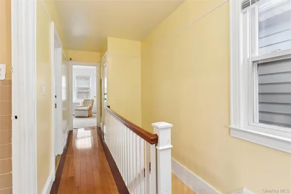 a view of a bathroom from a hallway